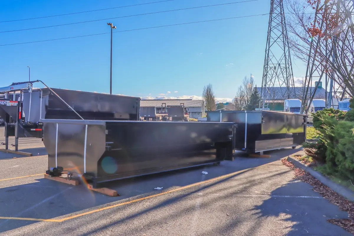 Roll-off dumpster ready for waste disposal at job site for 6 Yard Dumpster Rental in St. Albans